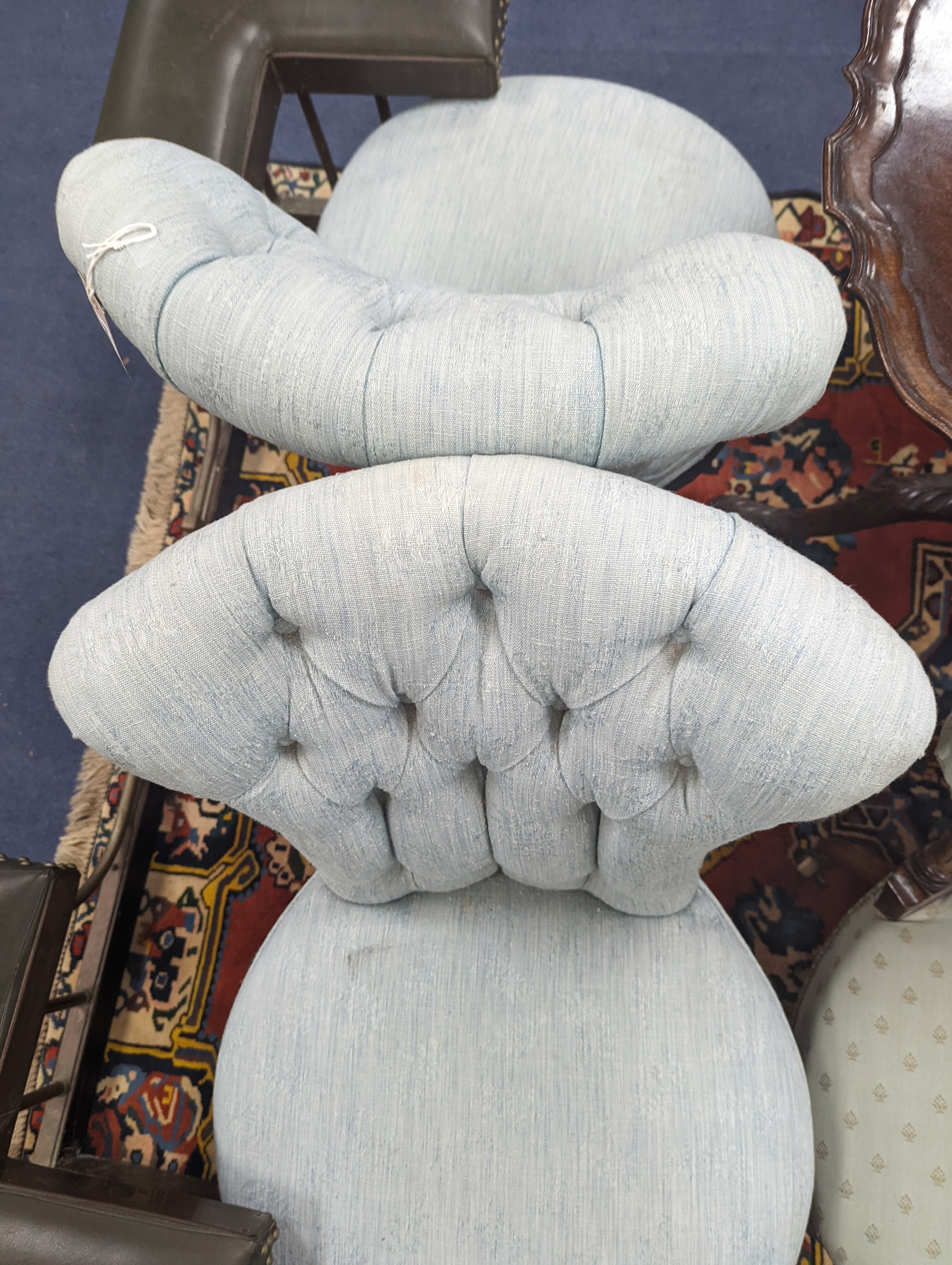 A pair of late 19th century French upholstered side chairs